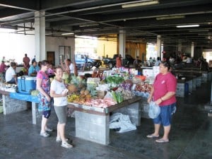 Doing the groceries shopping at the market.