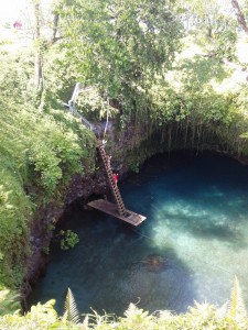 Climbing down the long ladder to the pool.