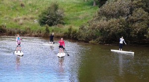 Paddling down the river.